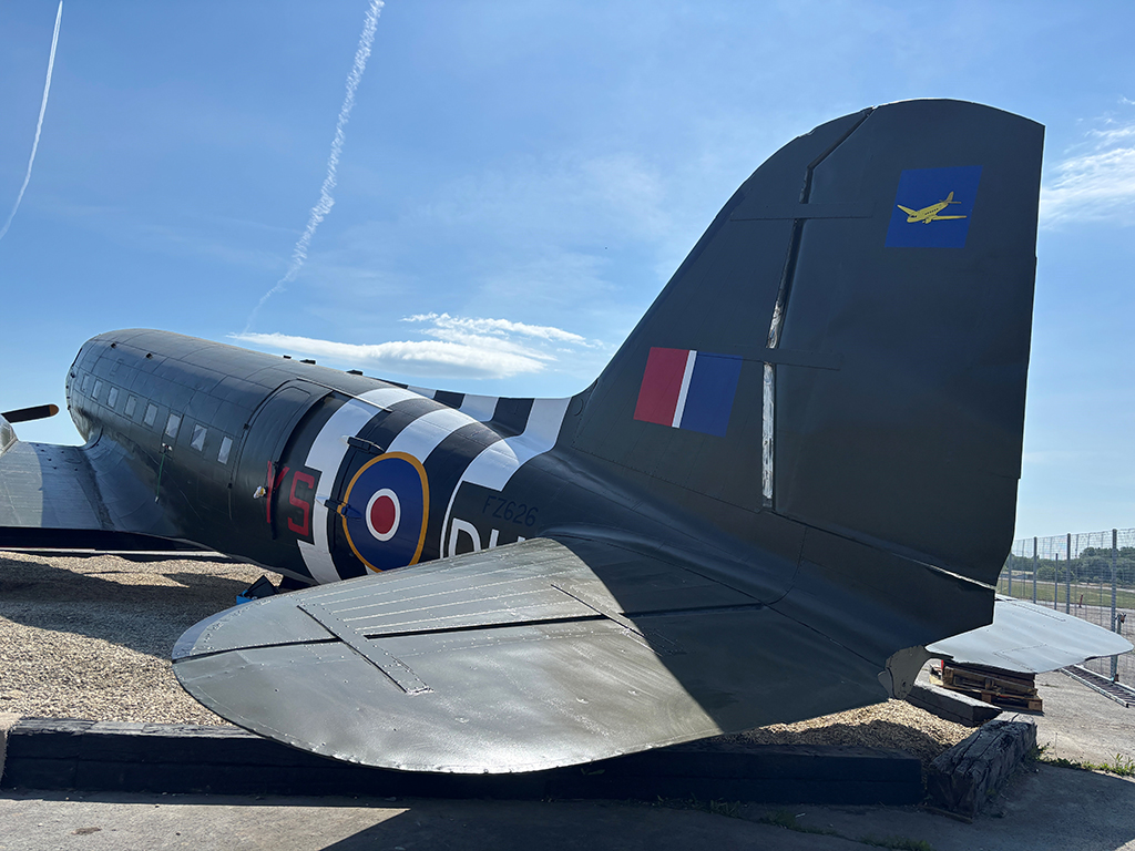 The C-47 Dakota Gate Guardian at 47 Air Dispatch sits proudly in its restored paint scheme - view from the port rear quarter.